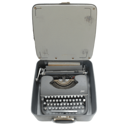Metal Japy typewriter in its vintage wooden box