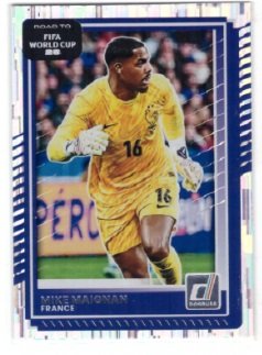 Panini Donruss Calcio trading card featuring goalkeeper Mike Maignan in a yellow jersey.