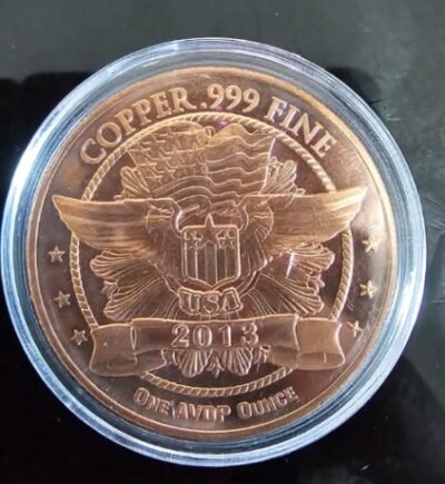 1 AVDP oz .999 fine copper bullion round featuring an American eagle design with a shield and the year 2013